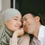 Woman wearing hijab reflecting, seeking guidance, emotional support, marriage counselling Singapore services