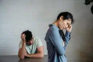 Asian couple arguing, tension in relationship, seeking conflict resolution, marriage counselling Singapore support