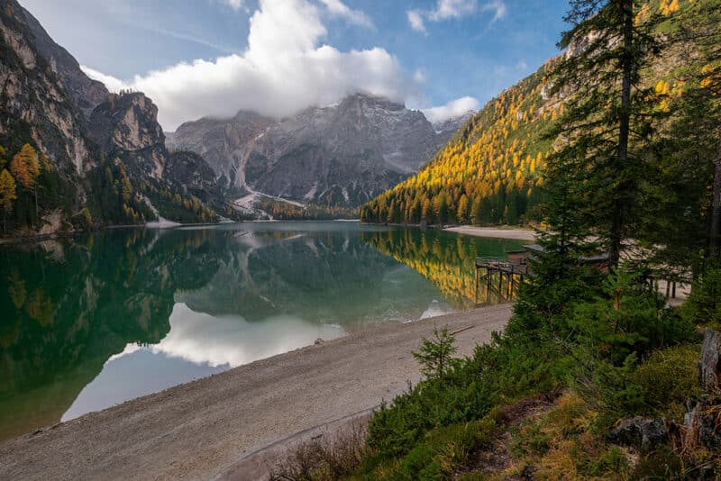 a lake surrounded by mountains and trees