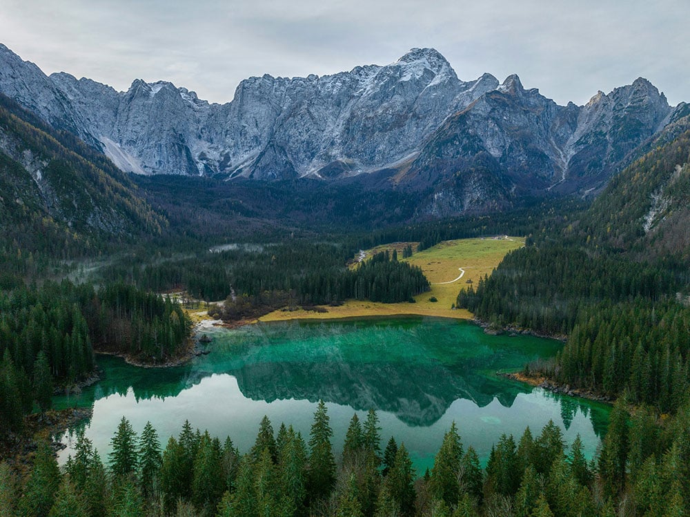A large lake surrounded by majestic mountains